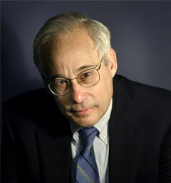 Headshot of Donald Berwick. Donald wears a suit and tie.